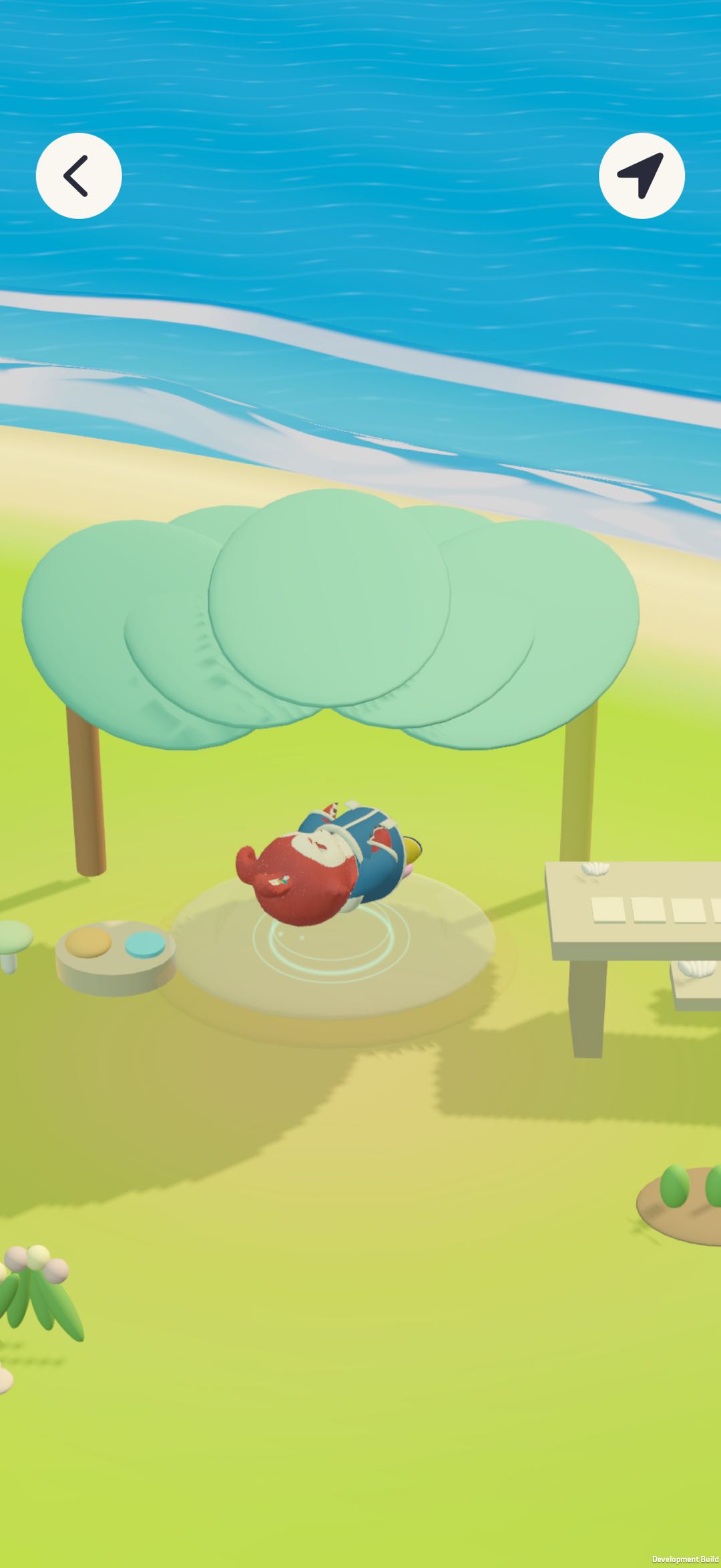 Wobbi resting under a leaf canopy on the island